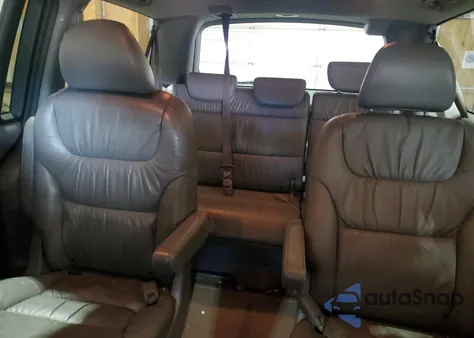 2010 Honda Odyssey Touring z USA, uszkodzony, nr VIN 5FNRL3H99AB018910